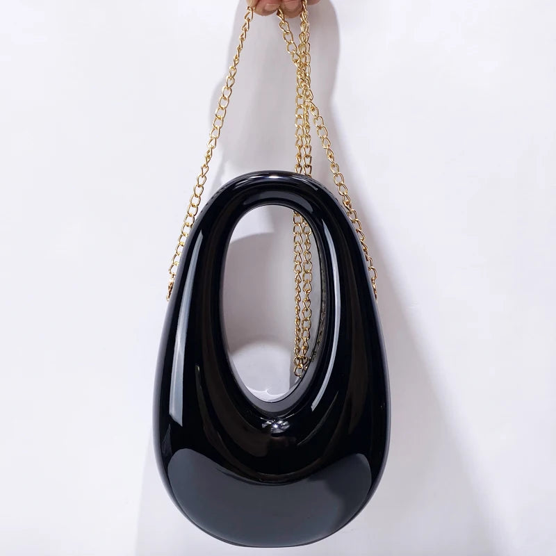 Sleek Oval Chain Bag – Modern Black Gloss Handbag