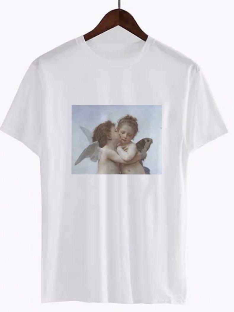 front view of the white tshirt with a print of two angels, one kissing the other on the cheek