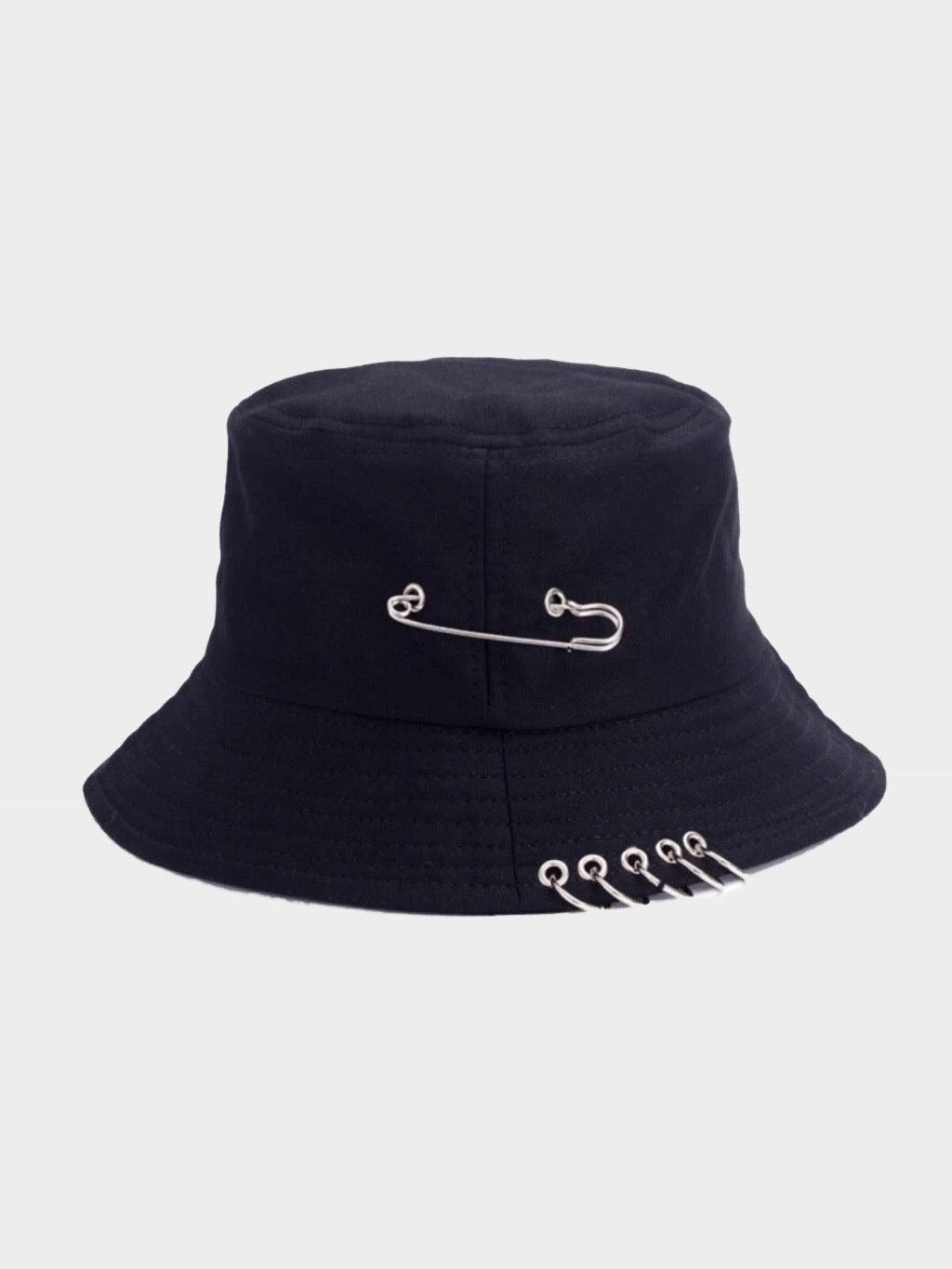 black bucket hat vh studios with a big pin into it and five rings around it