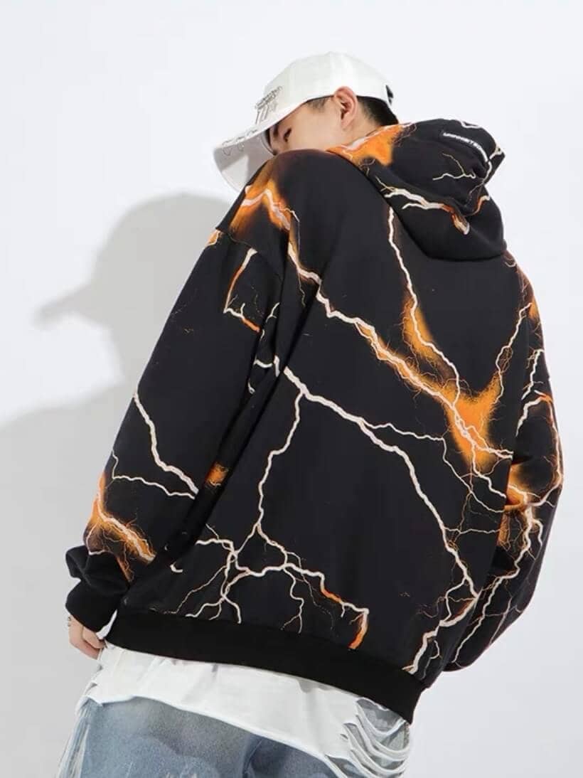 back view of our black hoodie with white flashes surrounded by an orange halo