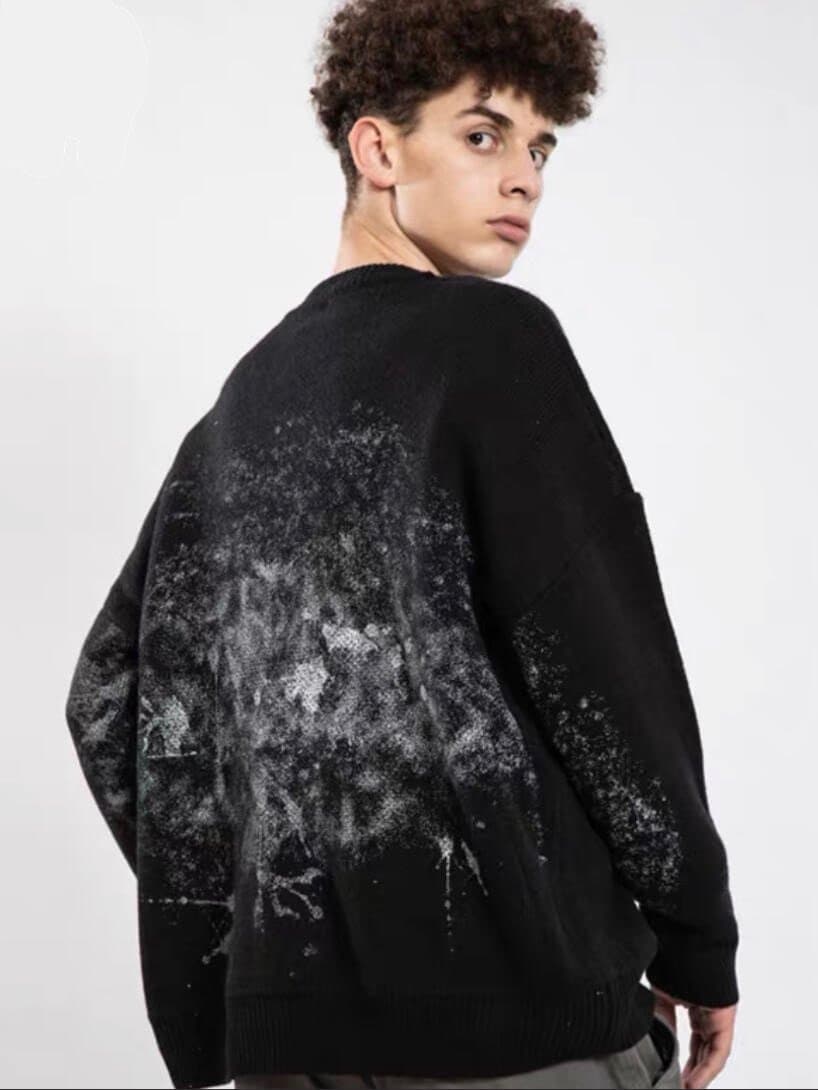 back view of our black sweater with a creepy smiling silhouette shadow printed with the text watch you. On the back there are white brushstrokes