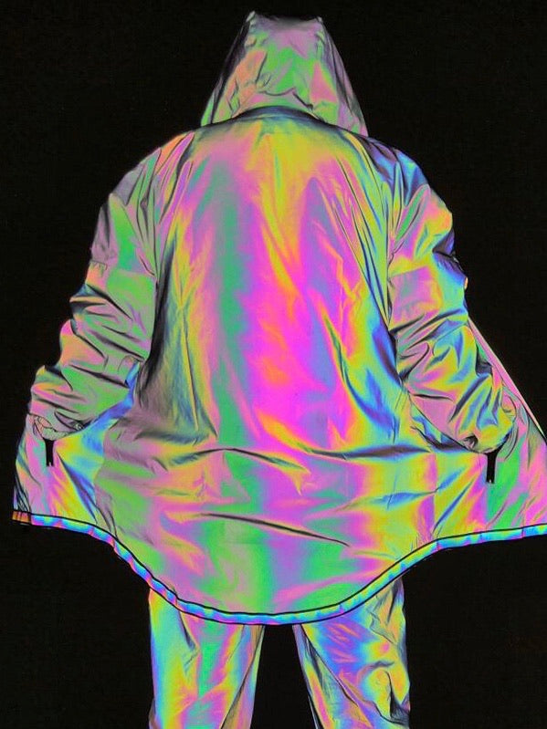 back view of our parka vh studios reflective, windproof and waterproof with a hood worn