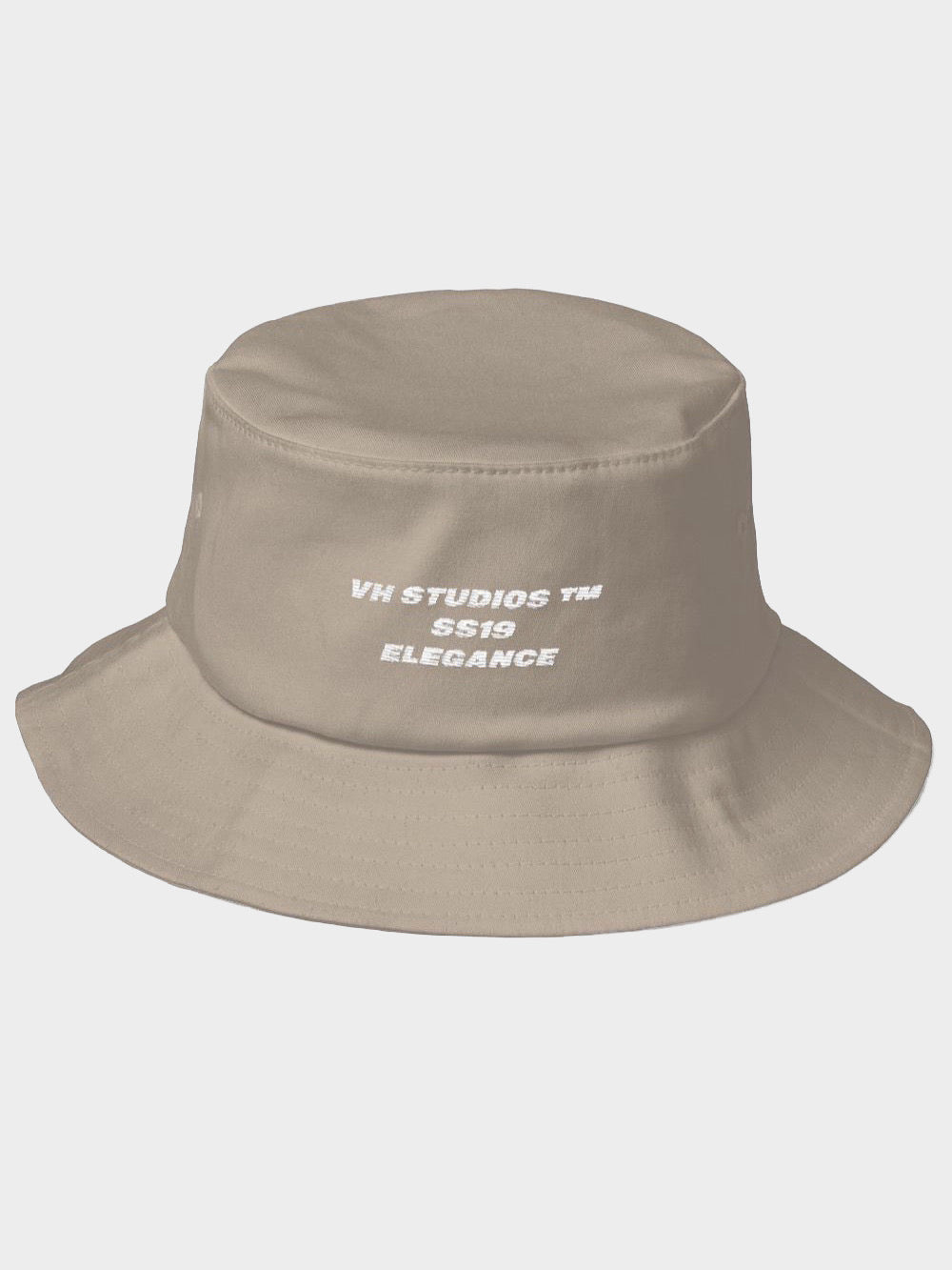 beige old school bucket hat vh studios elegance collection with the white capital letters text vh studio ss19 elegance