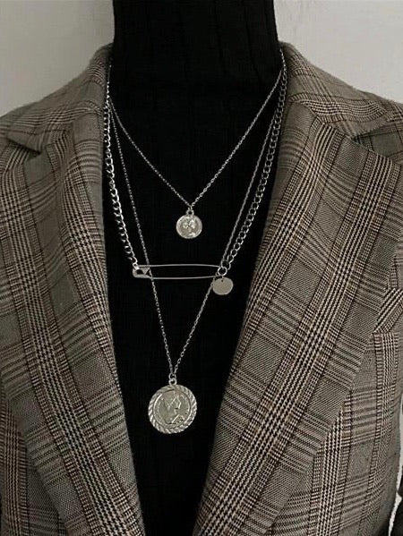 three layers necklace with two coins and one safety pin in silver