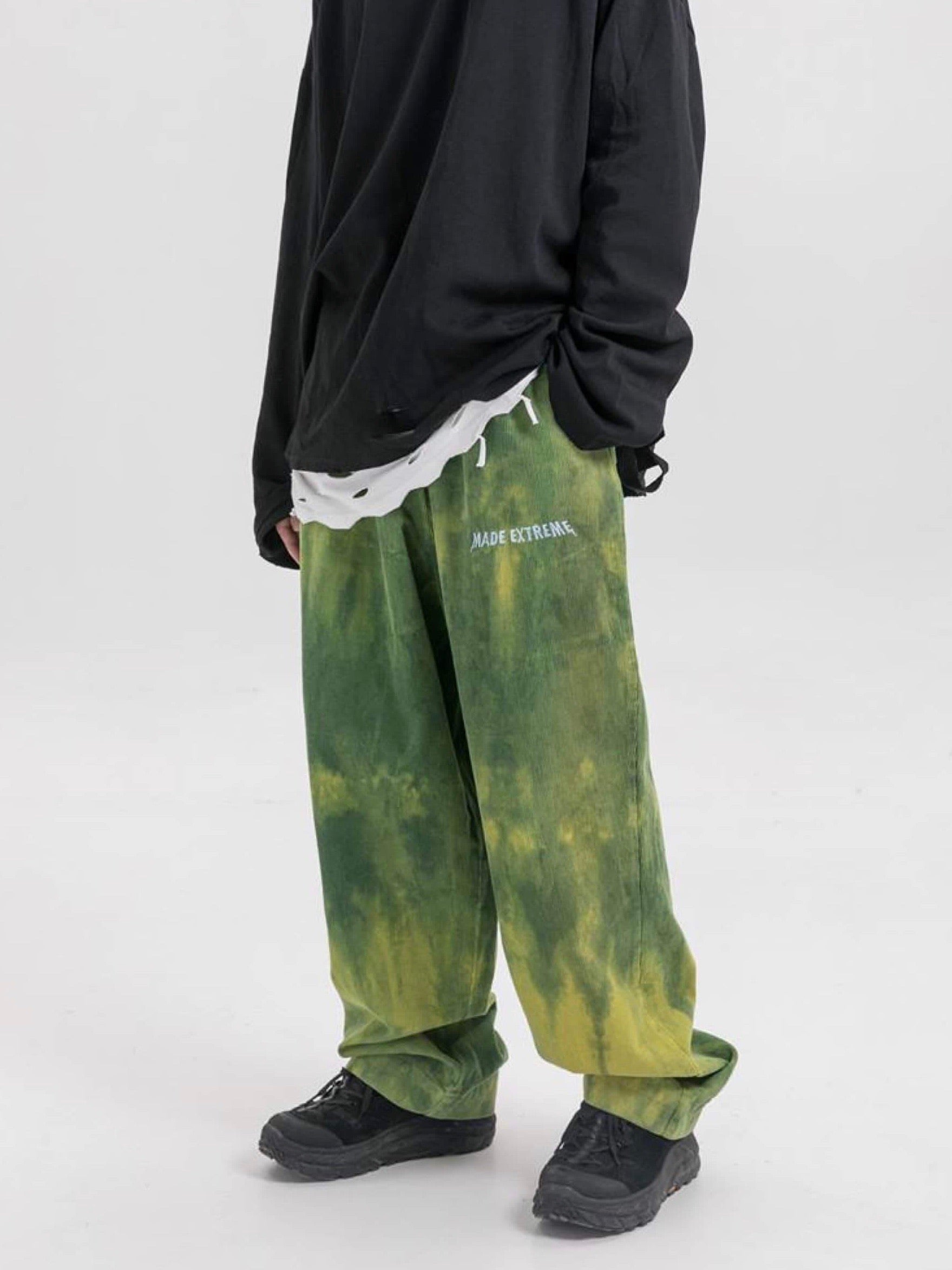 green tie and dye velvet long pants vh studios with made extreme embroidered in white on the top of the left thigh