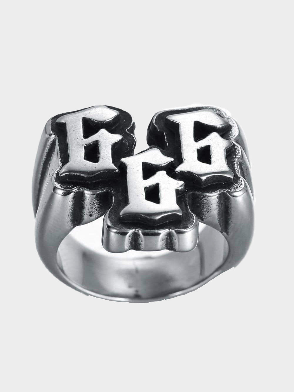 silver ring with 666  in relief on the top 