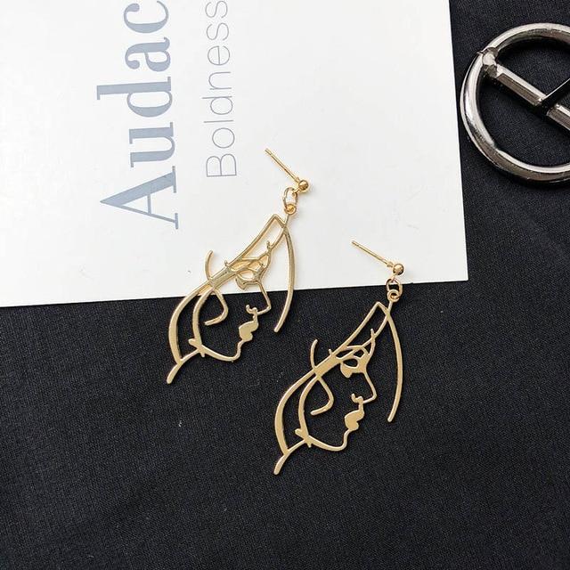 Gold Profile Face earrings