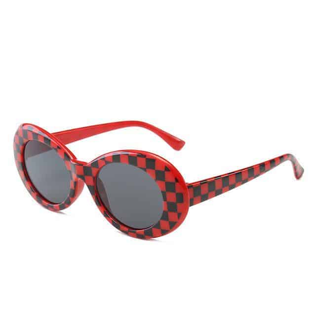 checkered black and red frame and purple and black glass sunglasses