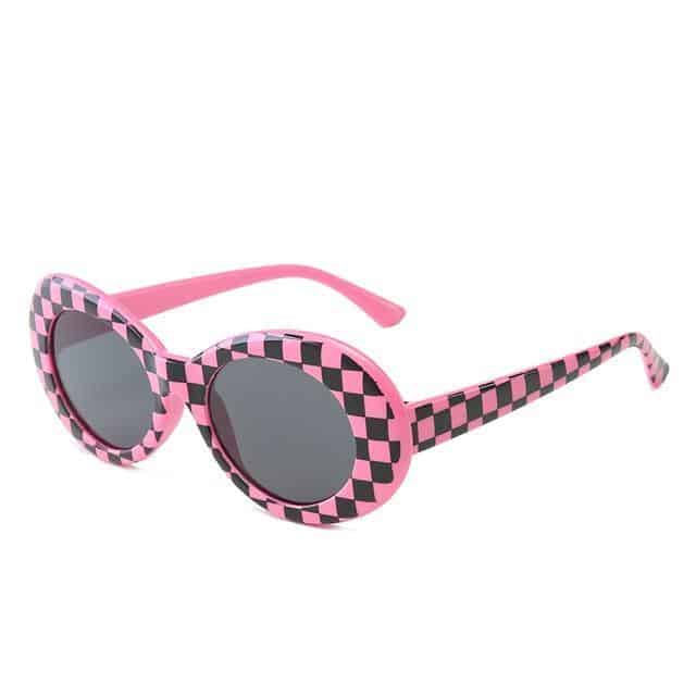 checkered black and pink frame and black glass sunglasses